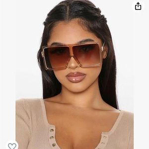 High Fashion oversized shades. As seen on the Kardashians.